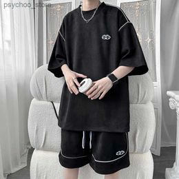 Men's Tracksuits New summer 2023 mens two-piece cotton casual T-shirt and shorts set mens sportswear fashion short sleeved track and field clothing Q240314