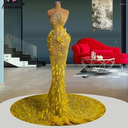 Runway Dresses Beaded Yellow Celebrity Mermaid Sleeveless Evening With Feathers Train Vestidos De Gala Crystals Prom