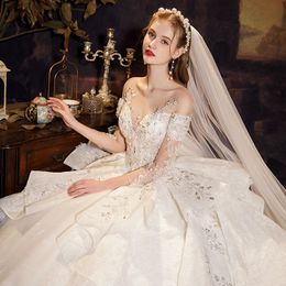 Dubai Arabisches Hochzeitskleid Plus Size Schatz glänzendes Kleid Kristallspitze Perlen Sweep Zug Langarm Brautkleider Vintage Bling Luxus Perlen Robe de Mariee