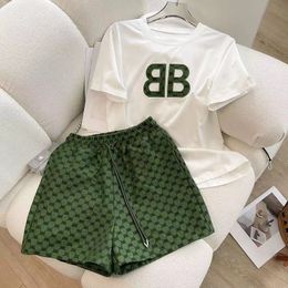 High end white casual shorts set, women's summer slimming fashion salt loose short sleeved sportswear two-piece set