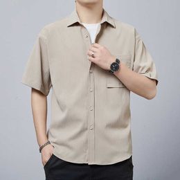 Summer ice silk short sleeved shirt for mens loose and casual lapel cardigan pocket decoration solid color simple and trendy shirt