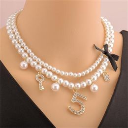 Pearl necklace for women short small fragrance style multi-layer fashion 5 word crystal pearl clavicle chain