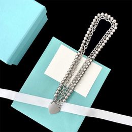 Designer New listed trendy punk style tiffay and co bead thick chain hanging love double ring overlapping titanium steel non fading Necklace