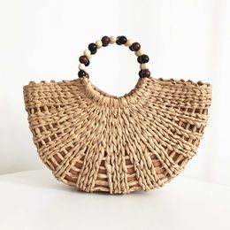 Internet celebrity Instagram hollow round straw woven bag, moon bag, wooden bead handle handbag, large capacity forest style vacation beach bag 240315