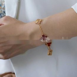 V bangle Four leaf clover five flower red chalcedony laser shooter bracelet V-gold high version lobster clasp four leaf clover bracelet five flower bracelet