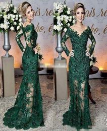 2023 Dark Green Mother of The Bride Dresses Sheer Jewel Neck Lace Appliques Long Sleeve Mermaid Formal Evening Prom Gowns4714620