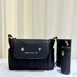 2024 nova bolsa de mamãe de comércio exterior para crianças de grande capacidade bebê multifuncional high-end moda personalizada bolsa de mamãe conjunto de 3 peças a1