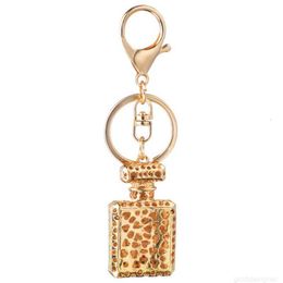 Designer Fashion Design Key Ring Perfume Bottle Keychains Holder for Women Creative Crystal Rhinestone Diamond Metal Car Keyring Chain Bag Pendant Gift good catego