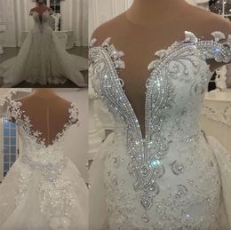 Bescheidene Meerjungfrau-Brautkleider mit abnehmbarem Rock, glänzende Pailletten, Kristalle, Perlen, Applikationen, transparenter Ausschnitt, rückenfrei, lange Brautkleider