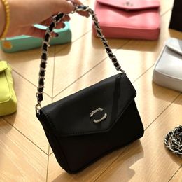 Fashion Designer bag New high quality cowhide fashion casual all-matching size 17X13cm bag Hand-held crossbody bag