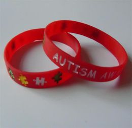 50PCS High Quality AUTISM Debossed And Ink Filled red and black Colour rubber wristbands for gifts Y04080122620067218064