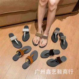 25% OFF Sports shoes 2024 G family character women in summer new style for external wear T-shaped clip toe with flat bottom and round head metal buckle slippers
