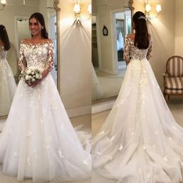 Graceful long sleeves country wedding dresses sheer bateau neck lace covered buttons bridal gowns sweep train tulle country robe de marie