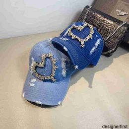 Designer New Korean version of love diamond denim perforated duckbill hat for women in autumn fashion versatile sun protection and sun shading baseball hat trend cat