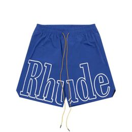 Дизайнерские шорты Rhude Shorts Летняя мода Пляжные брюки Мужчины Высокое качество Уличная одежда Красный Синий Черный Фиолетовый Брюки Мужские шорты Us Siize S-xl 3jffg
