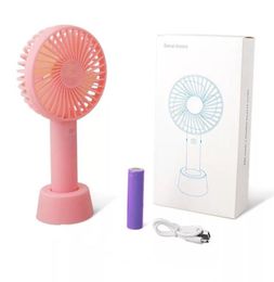 summer Mini handheld electric fan portable desktop with mobile phone bracket hand holding USB rechargeable three-speed wind speed mini fan