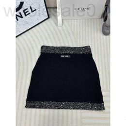 Skirts designer 24 Early Spring New Knitted Half Skirt Fashionable Korean Edition Contrast Colour Bead Design High Grade Girls Reduce Age and Cover Meat Women 3VJQ