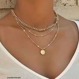 Fashionable multi-layer chain necklace for women with a minimalist temperament and a cool and cool style round pendant alloy collarbone neck chain
