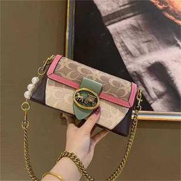 2024 New Contrast Colour Small Fashionable Shoulder Pulled Car Chain Womens Handbag sale 60% Off Store Online