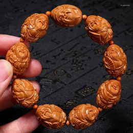 Strand Olive Nut Eight Mammon Master Hand Carved Bracelet