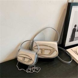 Xiaozhong Dingdang 2024 Portable Underarm Womens Spicy Girl Style Silver Shoulder Handbag sale 60% Off Store Online