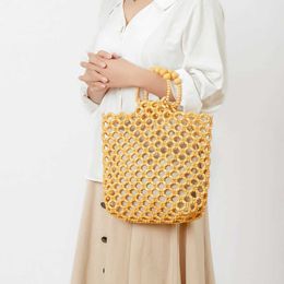 Shoulder Bags Handmade Woven Handbag for Women s Summer Niche Design Hollowed Out Commuting Wooden Bead Bag Women 240318