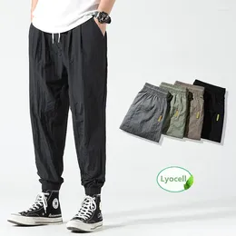 Men's Pants UNVANQU 2024 Summer Mens Stretch Korean Casual Ice Silk Slim Fit Elastic Waist Lyocell Classic Trousers Male Black Grey