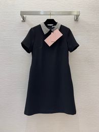 2024 Spring Black / Ivory Solid Colour Beaded Dress Short Sleeve Lapel Neck Sequins Short Casual Dresses B4M091315