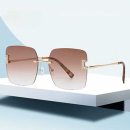 New Frameless Square Sunglasses Womens Fashion Trendsetter T-belt Drilling Net Red Large Frame Driving Glasses