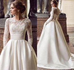 2020 New Design A Line Wedding Dresses Sheer Neck Long Sleeves Lace Appliques Beaded Satin With Pockets Sweep Train Plus Size Brid9748630