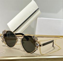 Sunglasses For Women Summer style AntiUltraviolet SHINE Retro oval metal frame Diamond chain fashion Eyeglasses Random Box3756377