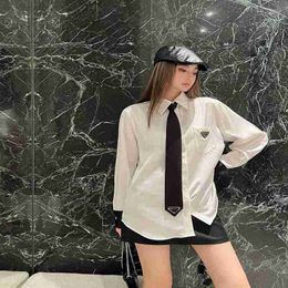 Women's Blouses & Shirts Designer Shirt Triangle Label Decoration Patchwork Cuffs Black Tie POLO Collar Spring Beautiful Fashion Casual Top LKBG