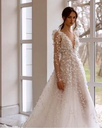 Hochzeitskleid, wunderschöne Spitze, Flora-Applikationen, lange Ärmel, offener Rücken, Illusion, hochgespaltene Roben de Mariage BC18412