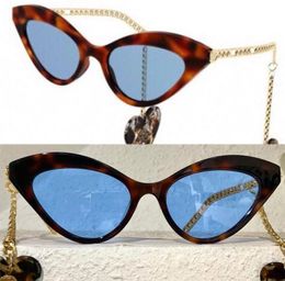 Womens sunglasses G0978S fashion classic heartshaped pendant metal temples cateye earrings sun glasses with zebra pattern frame 8915656