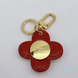 Designer Keychain Classic Clover Pattern Leather Metal Keychain Boutique Style Leather Bag Car Pendant Keyring Women Mens Gift Lanyards Buckle Jewellery