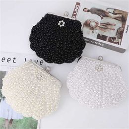 Hip Shoulder Bags Straight Fashion designer handbags tote Shell Pearl Dinner Bag Style Hand Hold Evening Bag 240311