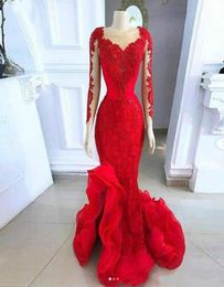 2020 Red Mermaid Evening Dresses Sheer Neckline Lace Appliqued Long Sleeve Prom Dress Low Split Sweep Train Arabic Formal Party Go6366700