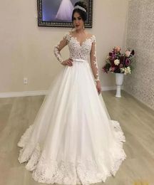 WhiteIvory Ball Gown Garden Wedding Dresses Bridal Gowns Jewel Neck Illusion Long Sleeve Bow Tie Belt Wedding Gown1916784