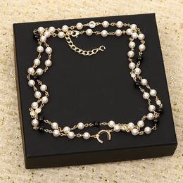 2024 Luxury quality charm sweater pendant necklace with diamond and white nature shell beads black color in 18k gold plated have stamp bo PS3230B