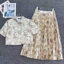 Luxury Women's Dress Designer Two-piece Dress For Women 2024 Spring/summer New Short Shirt Pleated Half Skirt Unicorn Print Floral Suit 888e