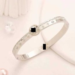 English lock finger letter L diamond-inlaid c hollow steel bracelet letter V Jewellery famous designer casual couple bracelet star with the same style 2403193