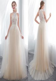 New Designer Champagne Halter Neck A Line Tulle Wedding Dresses Lace Appliqued Sleeveless Summer Beach Wedding Bridal Gowns CPS1012889878