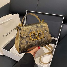 Shop design handbag wholesale retail 2024 Niche Dign Autumn and Winter New Womens Bags Are Fashionable High-end. Shoulder Portable Small Bag