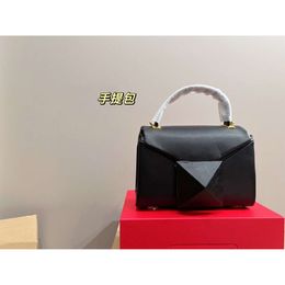 Shop design handbag wholesale retail New Spring/summer Trend Fashion Rivet Charm Bag Style Small Handheld Shoulder Womens Soft