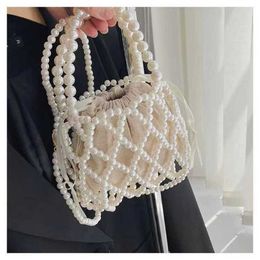 Top Shoulder Bags French designer handbags tote Bag Woven Beaded Bucket Portable Crossbody Design Pearl 240311