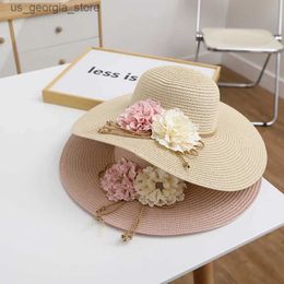 Wide Brim Hats Bucket Hats Hot selling fashion and beautiful flower Str hat in 2023 summer Brim sun hat Panama hat womens holiday UV resistant folding beach hat Y240319