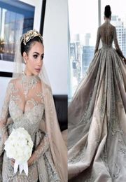 2020 Luxury Crystal Beaded Mermaid Wedding Dresses With Detachable Train Sexy High Neck Long Sleeves Arabic Mulslim Bridal Gown3125103