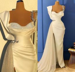 2022 Elegant White Sequin Prom Dresses Spaghetti Straps Mermaid Sexy Backless Sleeveless Evening Gowns Vintage Arabic Party Dress 6425462
