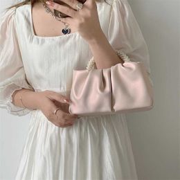 Top Shoulder Bags designer handbags Pearl Handheld tote Bag Womens Fashion Versatile Folded Crossbody Cloud Light Phone 240311