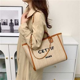 Top Shoulder Bags Small Fashion Handheld Designer Handbags Tote Bag Womens Grass Woven Large Capacity Chain Beach Bag 240311